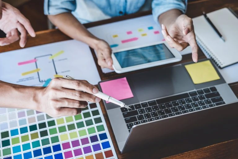 Creative design team planning brand concept together — Swonie Branding & Design